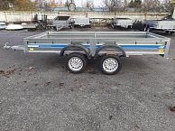 Прицеп Кремень стандарт плюс двухосный 3,0*1,56А см с бортом 31 с тентом 120 см