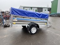 Прицеп Кремень стандарт плюс 2,5*1,3 с бортом 50 см с тентом 30 см