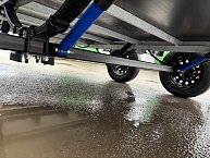 Прицеп Кремень стандарт плюс двухосный 3,0*1,56А см с бортом 50 с тентом 100 см